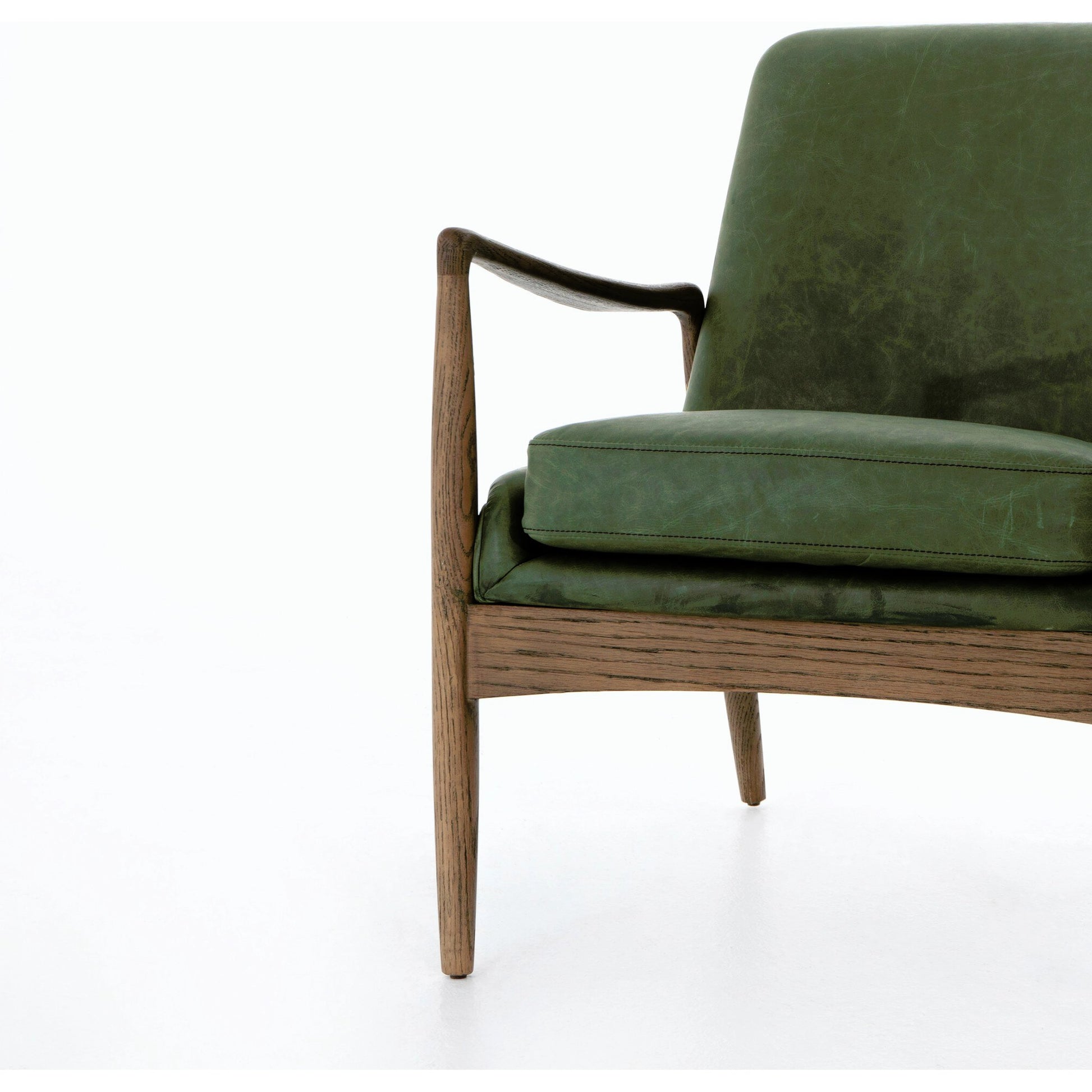 Braden Chair by Four Hands. Made from top grain leather, solid oak, 100% polyester in a modern style.