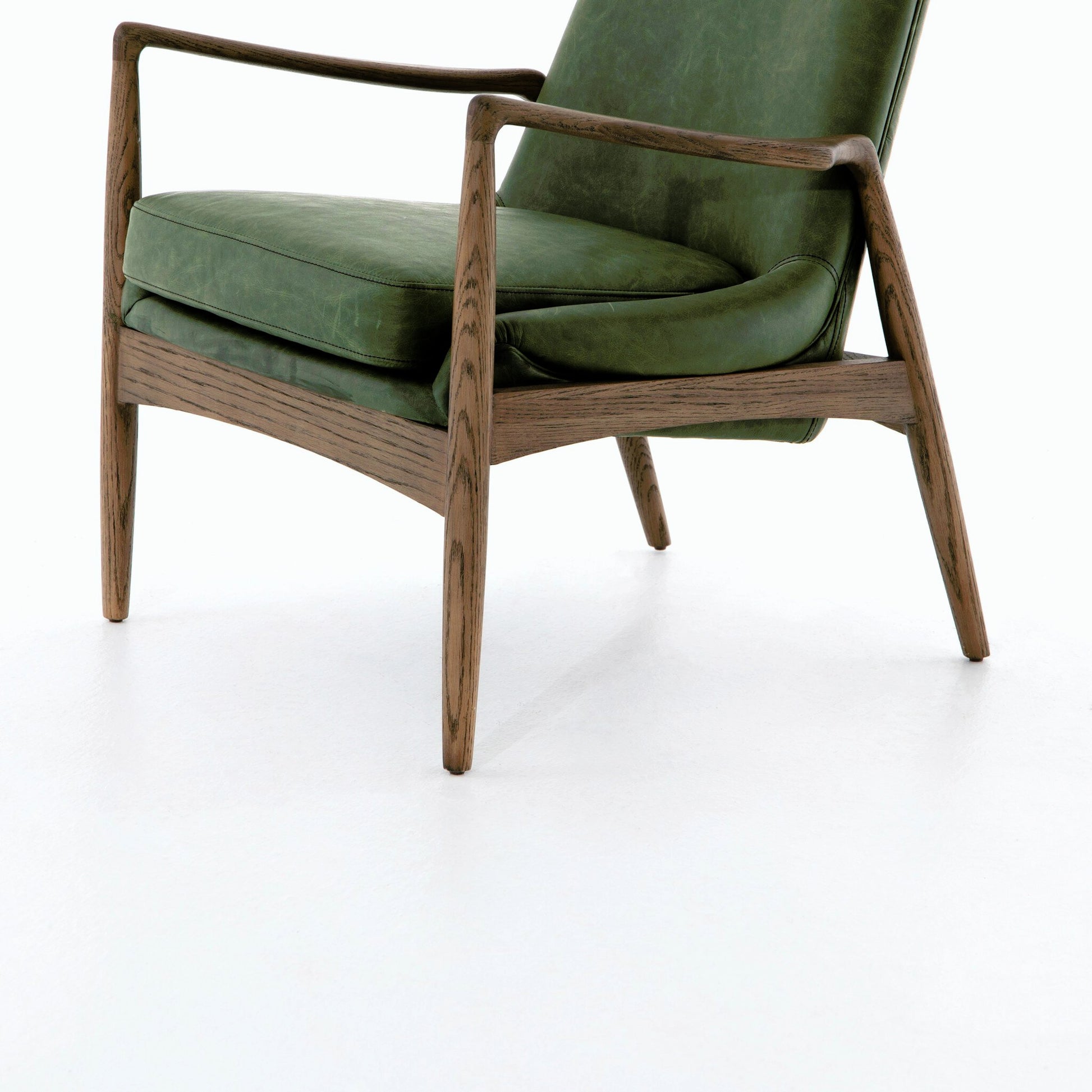 Braden Chair by Four Hands. Made from top grain leather, solid oak, 100% polyester in a modern style.