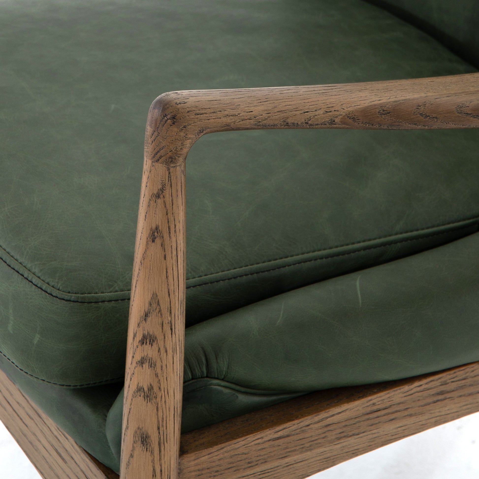 Braden Chair by Four Hands. Made from top grain leather, solid oak, 100% polyester in a modern style.