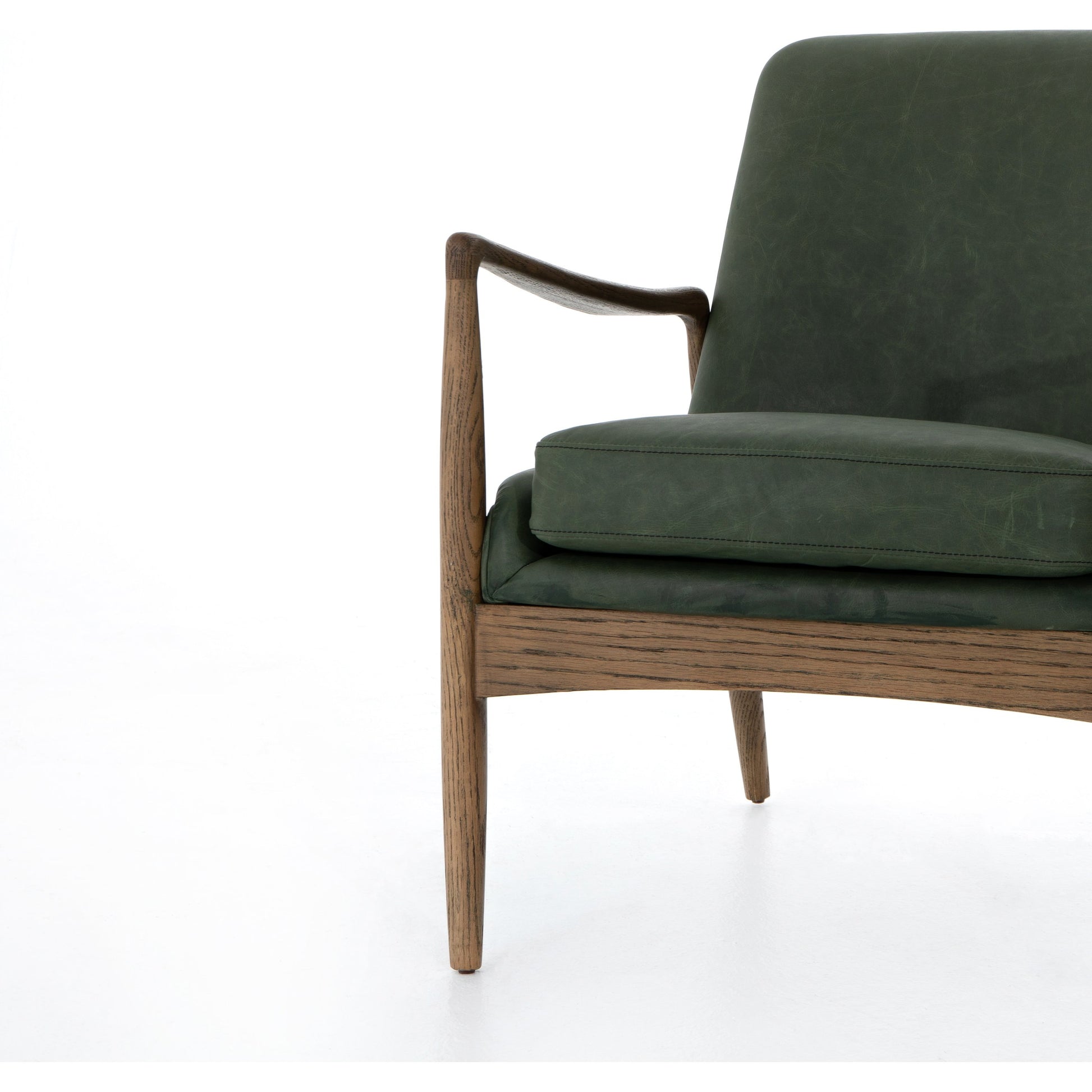Braden Chair by Four Hands. Made from top grain leather, solid oak, 100% polyester in a modern style.