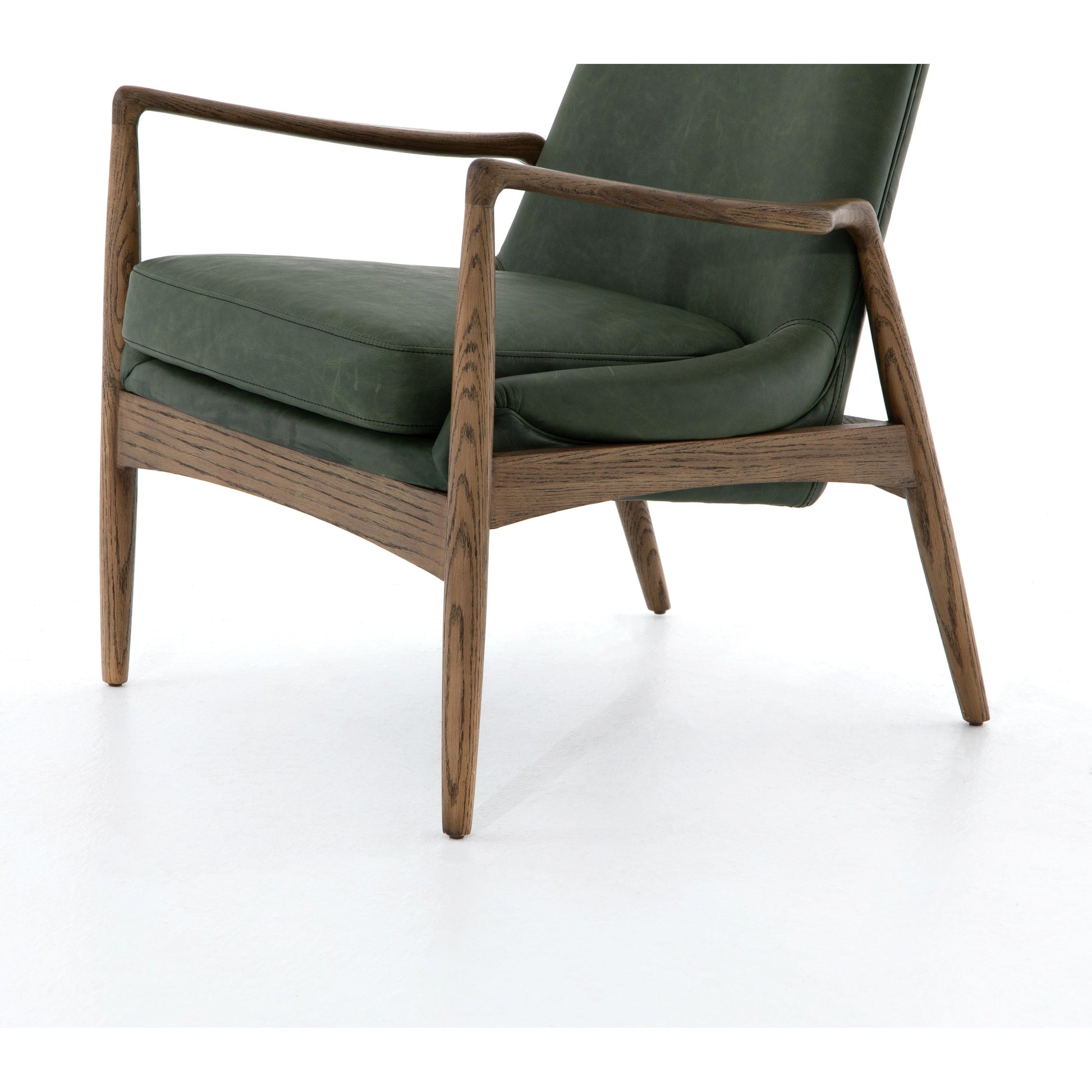 Braden Chair by Four Hands. Made from top grain leather, solid oak, 100% polyester in a modern style.
