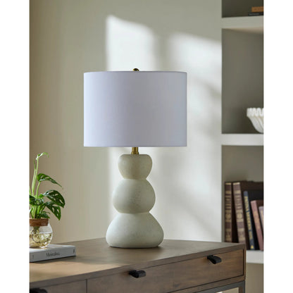 Cayey Accent Table Lamp by Livabliss in body: cream; shade: white; finial: metallic - brass; harp: metallic - brass; cord: translucent and paintedplated. Made from resin, linen, polyester, steel in a transitional style.