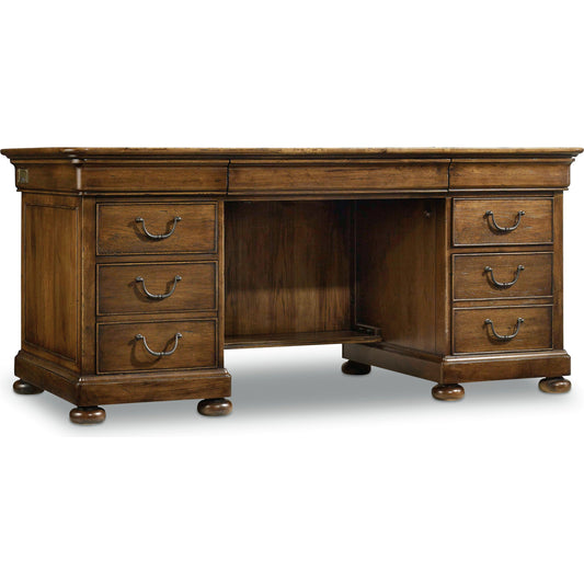 Archivist Executive Desk by Hooker Furniture in pecan. Made from pecky pecan veneers in a traditional style.
