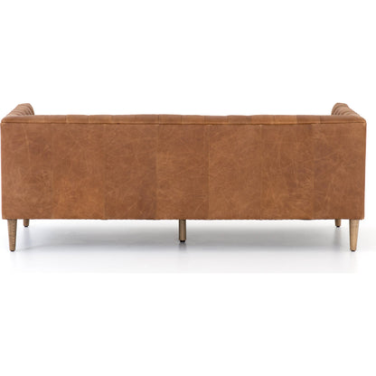 Williams Leather Sofa by Four Hands. Made from top grain leather, solid ash, 100% polyester in a rustic style.