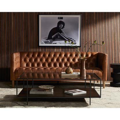 Williams Leather Sofa by Four Hands. Made from top grain leather, solid ash, 100% polyester in a rustic style.