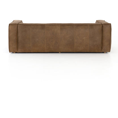 Nolita Reverse Stitch Sofa by Four Hands in rider black. Made from top grain leather, solid ash, 100% polyester in a modern style.