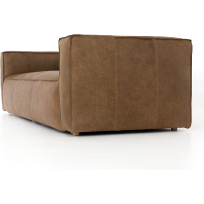 Nolita Reverse Stitch Sofa by Four Hands in rider black. Made from top grain leather, solid ash, 100% polyester in a modern style.