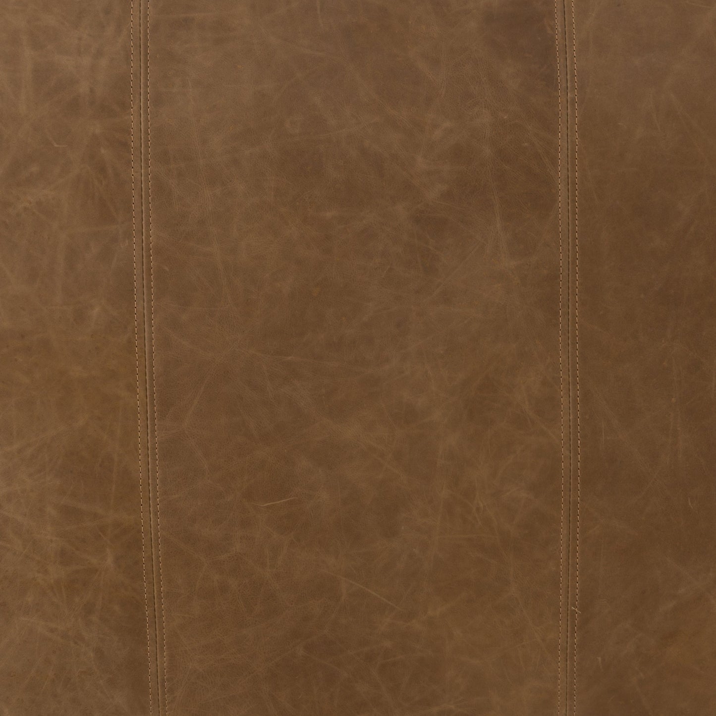 023 SR-369159 | Closeup | Nolita Reverse Stitch Sofa by Four Hands. Made from top grain leather, solid ash, 100% polyester in a modern style.