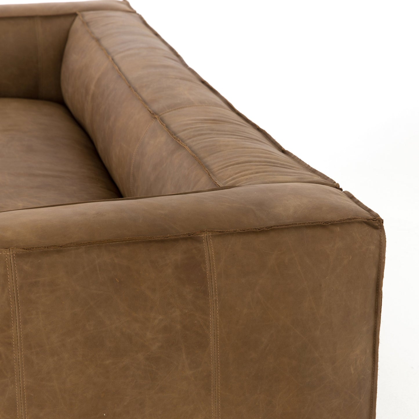 025 SR-369159 | Closeup | Nolita Reverse Stitch Sofa by Four Hands. Made from top grain leather, solid ash, 100% polyester in a modern style.