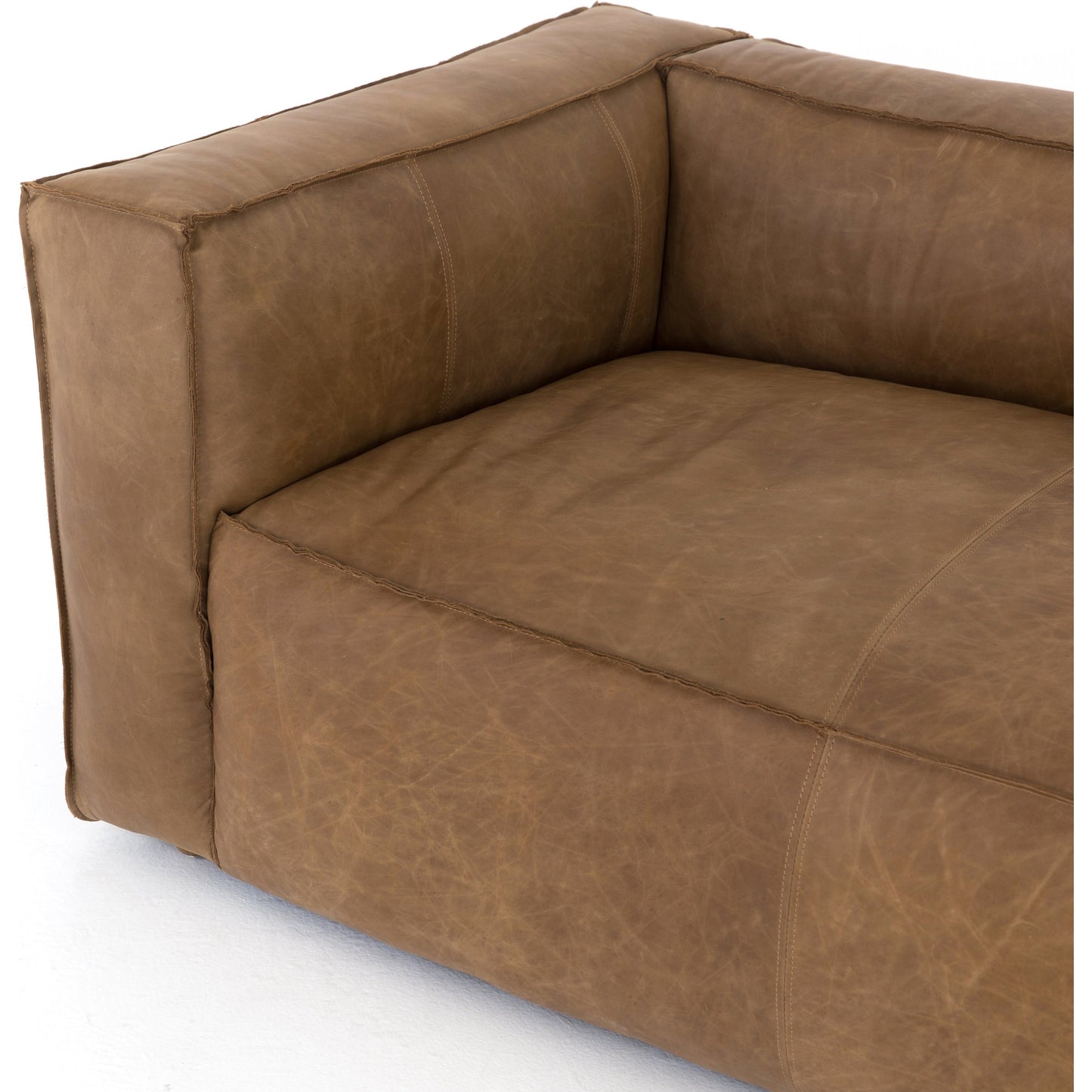 027 SR-369159 | Closeup | Nolita Reverse Stitch Sofa by Four Hands. Made from top grain leather, solid ash, 100% polyester in a modern style.