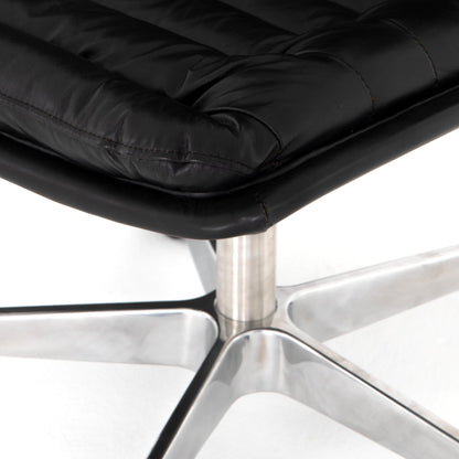 Malibu Desk Chair by Four Hands in rider black. Made from top grain leather, aluminum, 100% polyester in a modern style.