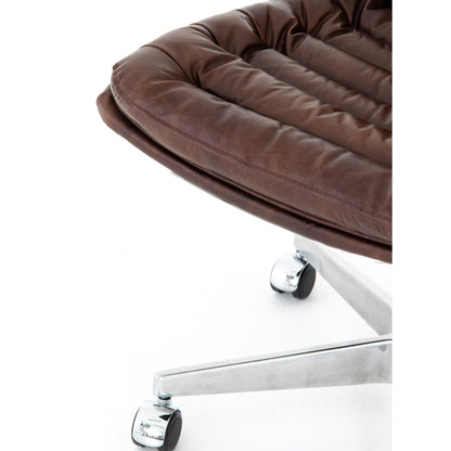 Malibu Desk Chair by Four Hands in rider black. Made from top grain leather, aluminum, 100% polyester in a modern style.