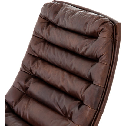 Malibu Desk Chair by Four Hands in rider black. Made from top grain leather, aluminum, 100% polyester in a modern style.