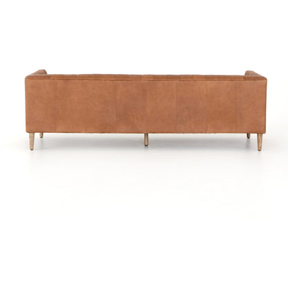 Williams Leather Sofa by Four Hands. Made from top grain leather, solid ash, 100% polyester in a rustic style.