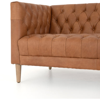 Williams Leather Sofa by Four Hands. Made from top grain leather, solid ash, 100% polyester in a rustic style.