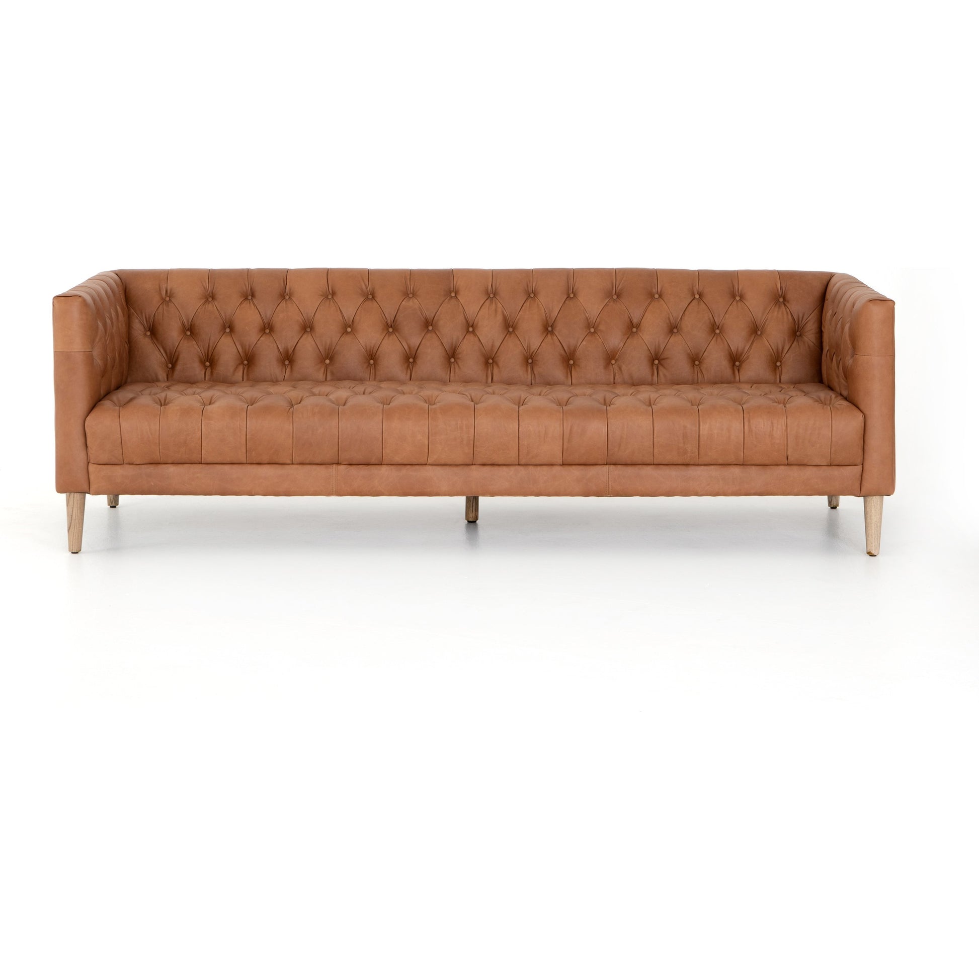 Williams Leather Sofa by Four Hands. Made from top grain leather, solid ash, 100% polyester in a rustic style.