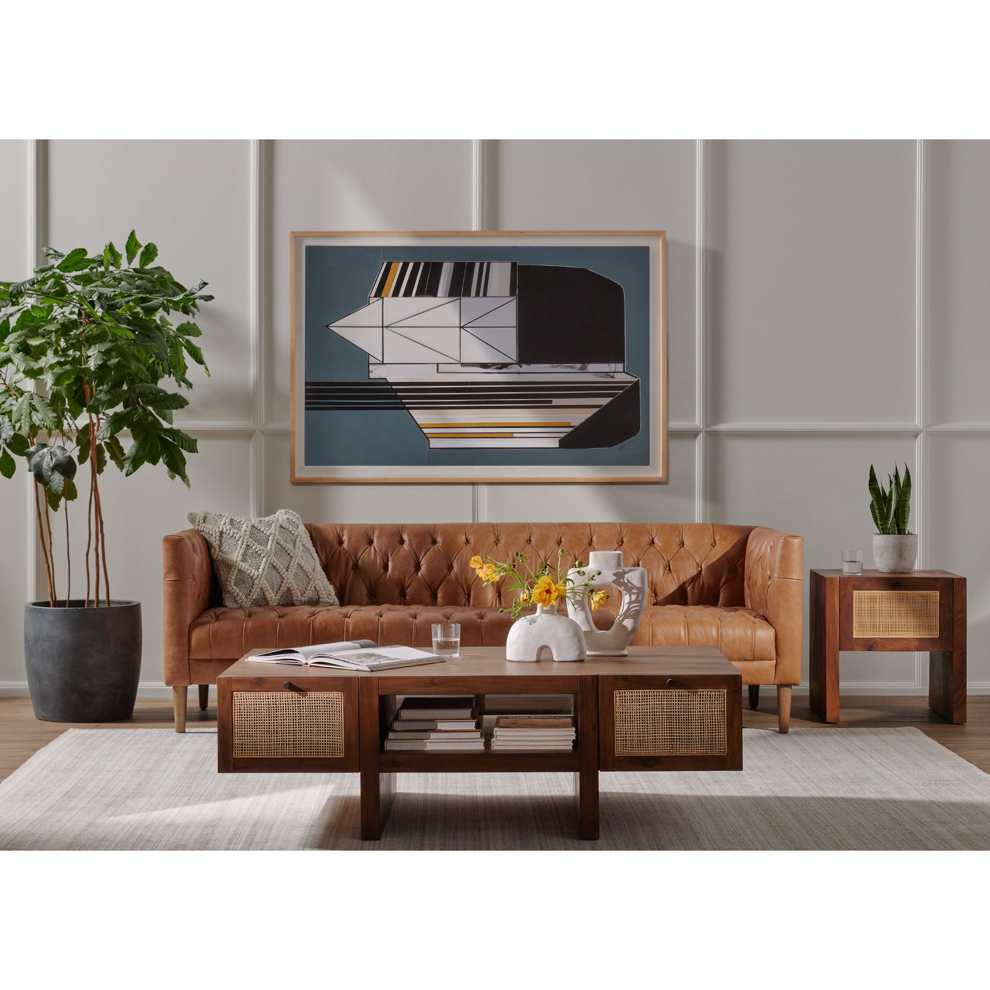 Williams Leather Sofa by Four Hands. Made from top grain leather, solid ash, 100% polyester in a rustic style.