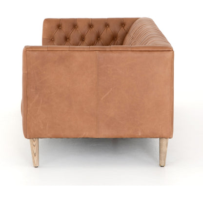 Williams Leather Sofa by Four Hands. Made from top grain leather, solid ash, 100% polyester in a rustic style.