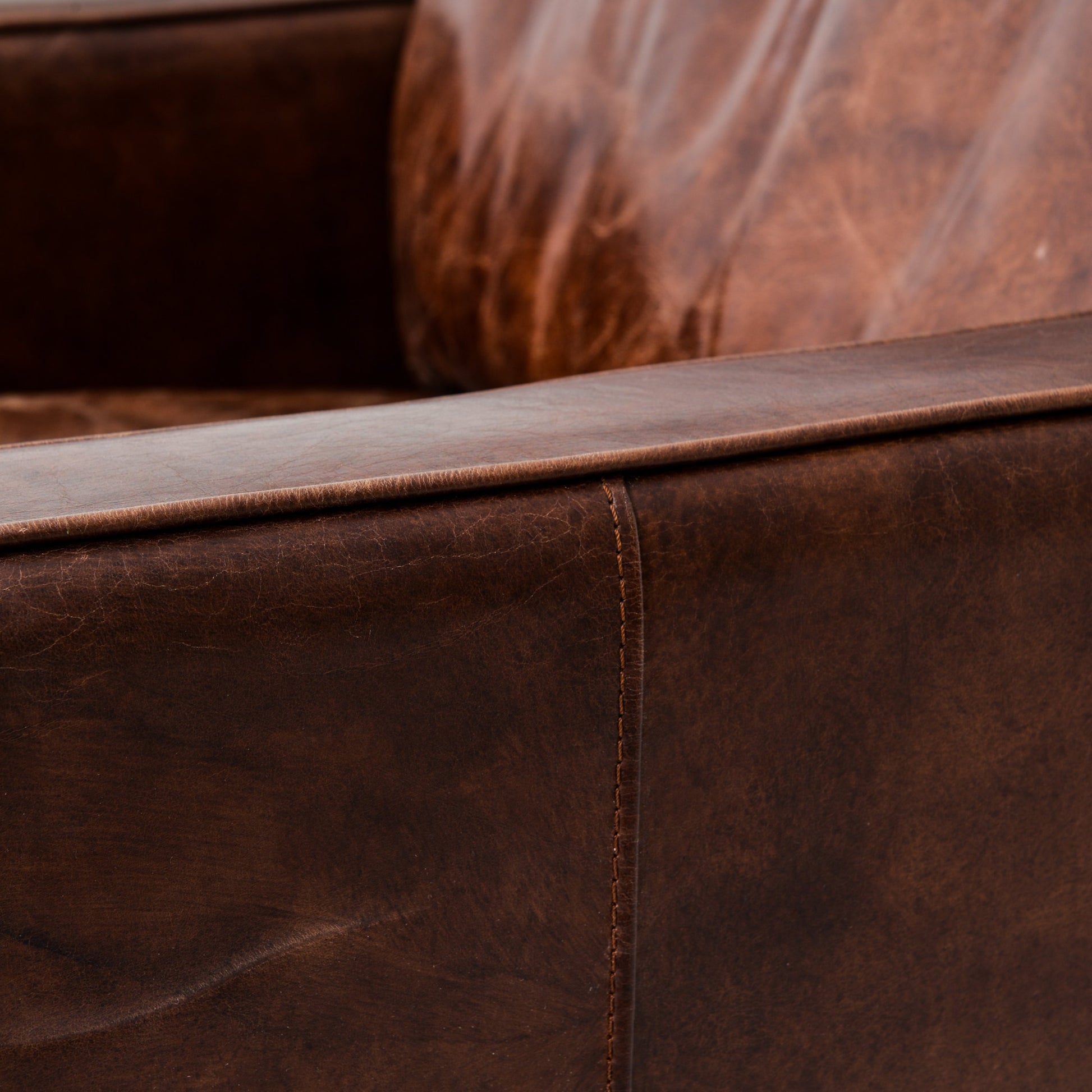 Larkin Club Chair by Four Hands in cigar and antique oak, antique brass nailhead. Made from top grain leather, solid ash, iron in a modern style.