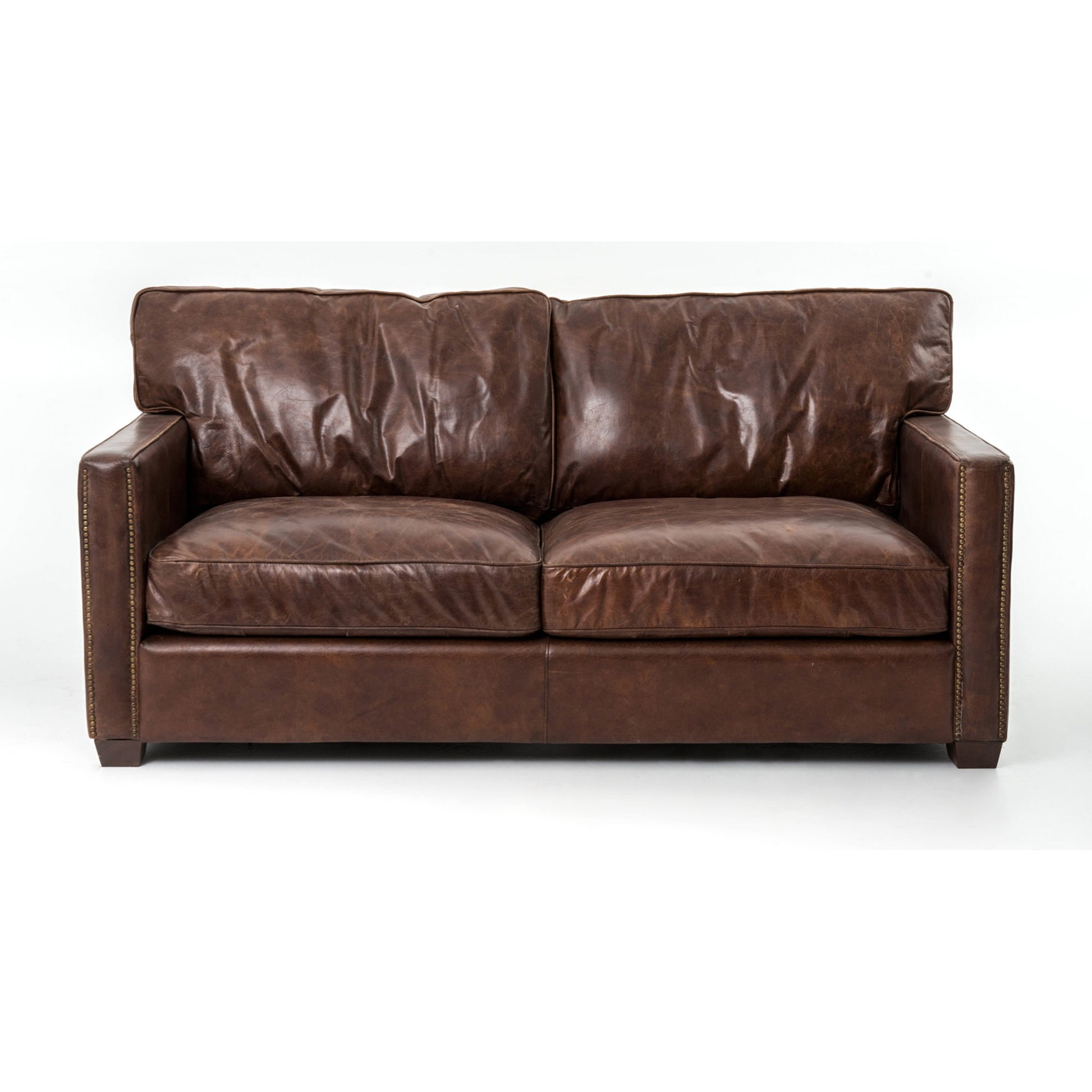 Larkin Sofa by Four Hands in cigar, antique oak, antique brass nailhead. Made from top grain leather, solid ash, iron in a modern style.