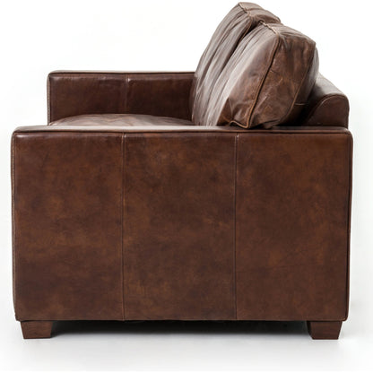 Larkin Sofa by Four Hands in cigar, antique oak, antique brass nailhead. Made from top grain leather, solid ash, iron in a modern style.