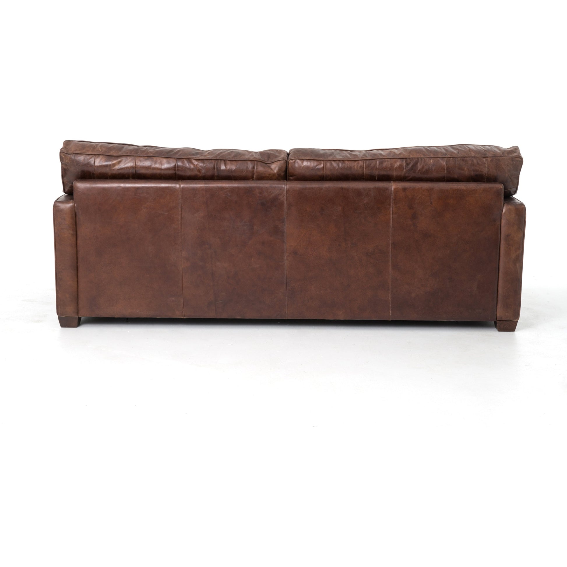 Larkin Sofa by Four Hands in cigar, antique oak, antique brass nailhead. Made from top grain leather, solid ash, iron in a modern style.