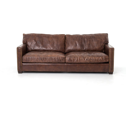 Larkin Sofa by Four Hands in cigar, antique oak, antique brass nailhead. Made from top grain leather, solid ash, iron in a modern style.