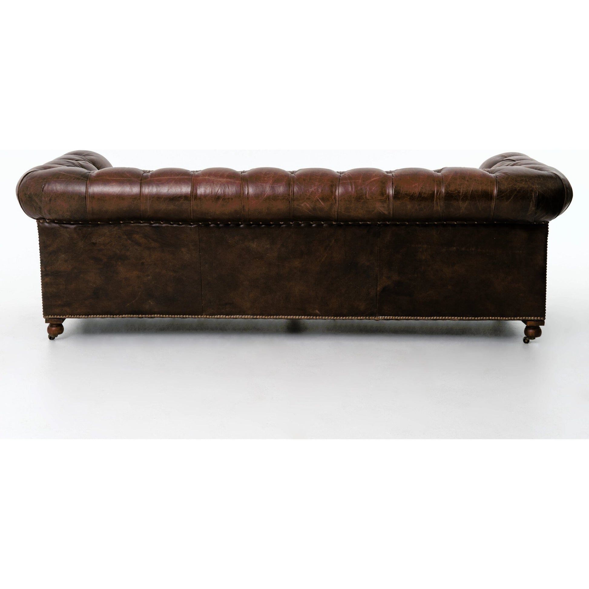Conrad Sofa by Four Hands in cigar, antique oak, antique brass nailhead. Made from top grain leather, solid ash, iron in a traditional style.