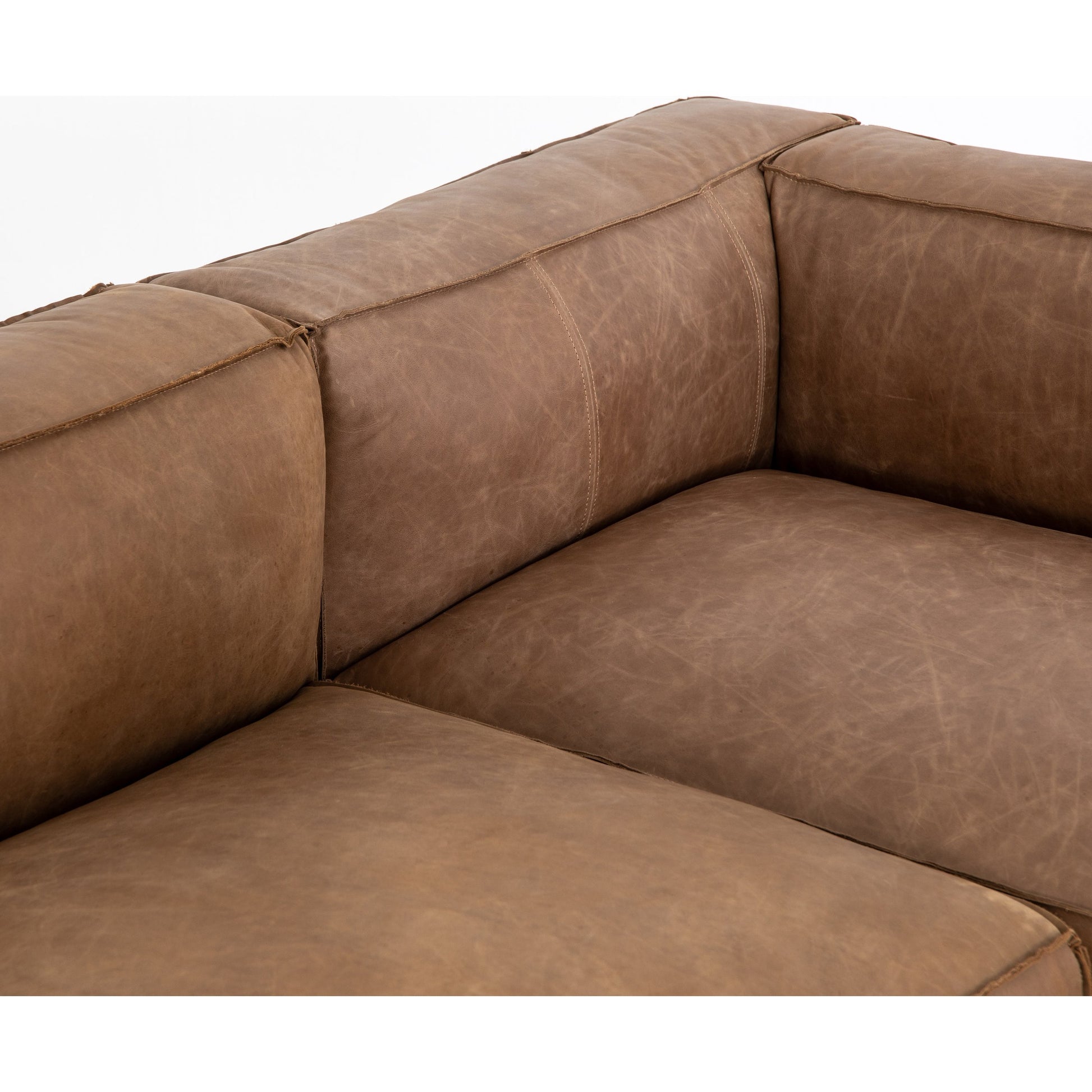 Nolita Sectional Sofa by Four Hands in natural washed. Made from top grain leather, solid ash, 100% polyester in a modern style.