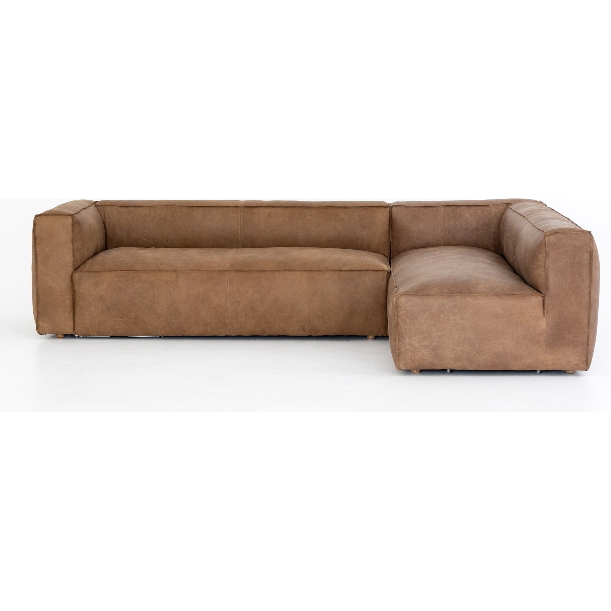Nolita Sectional Sofa by Four Hands in natural washed. Made from top grain leather, solid ash, 100% polyester in a modern style.
