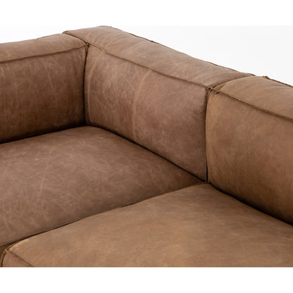 Nolita Sectional Sofa by Four Hands in natural washed. Made from top grain leather, solid ash, 100% polyester in a modern style.
