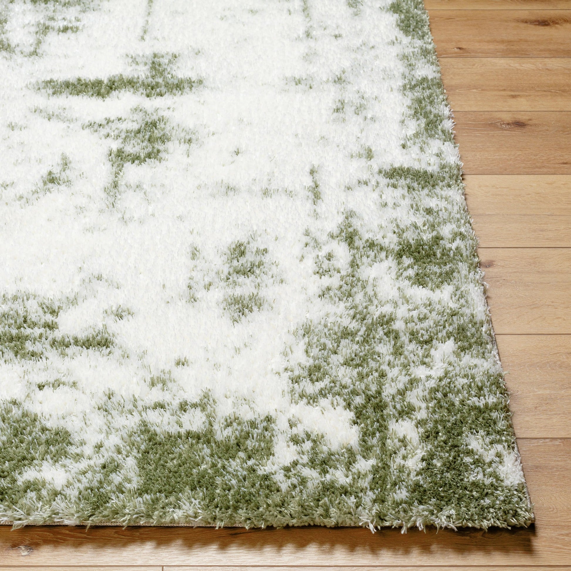 Cloudy Shag Rug - 490572 by Livabliss in off-white, grass green. Made from face: 100% polyester, warp: 60% jute, 40% polyester in a unique style.