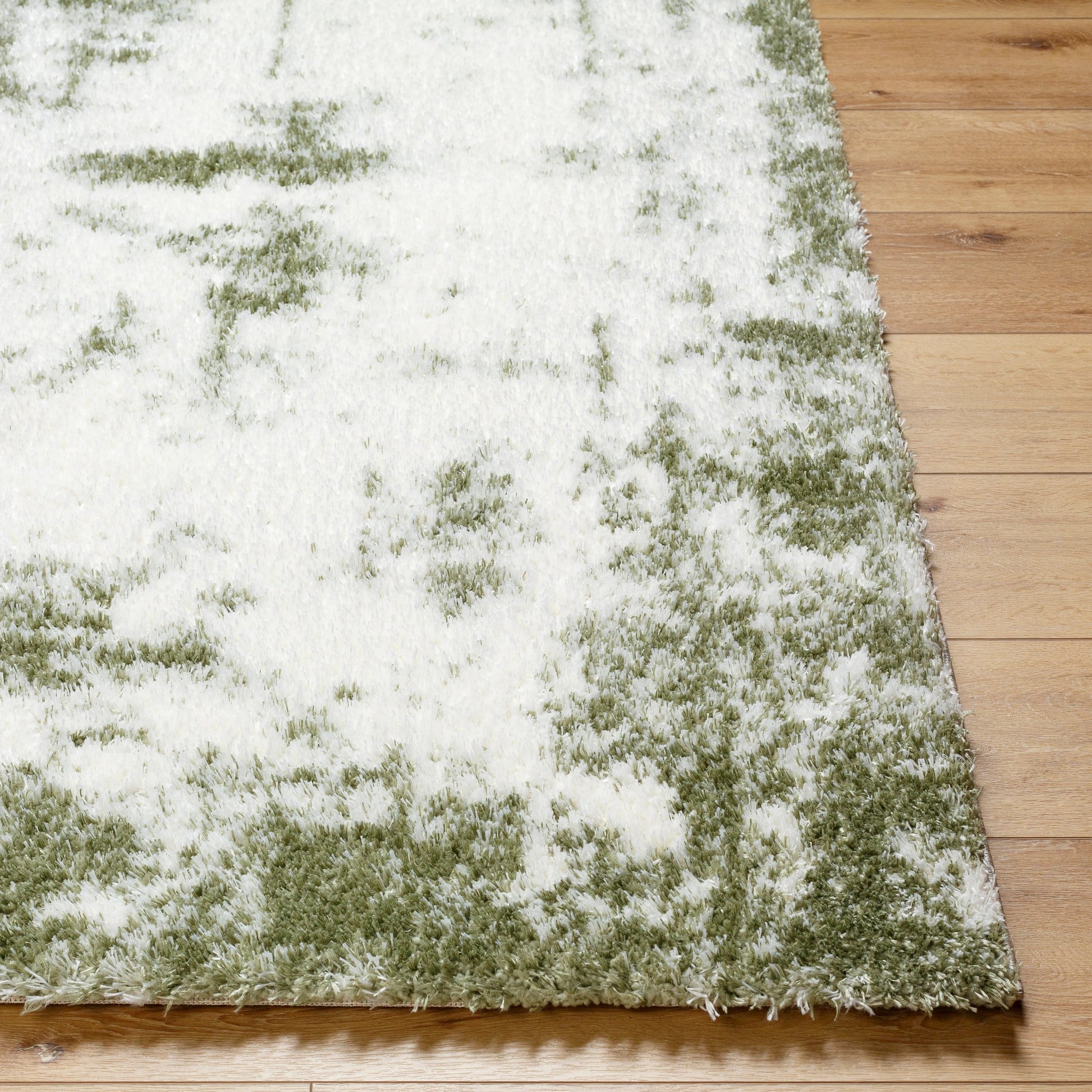 Cloudy Shag Rug - 490572 by Livabliss in off-white, grass green. Made from face: 100% polyester, warp: 60% jute, 40% polyester in a unique style.