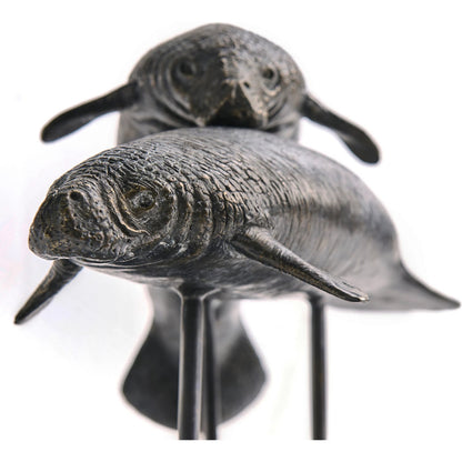 Raised Manatee Bronze Statue with Marble Base by Jonathan Charles in dark rustic waxed bronze. Made from main brass in a unique style.