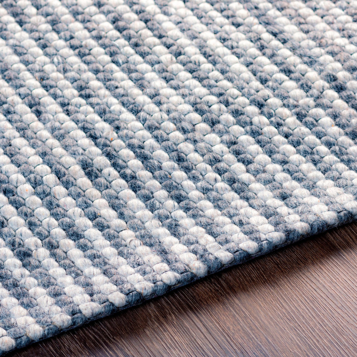 005 SI-1879708,SI-1879710,SI-1879712 | Closeup | Colarado CDO-2303 Rug by Surya in medium gray. Made from 100% wool in a unique style.