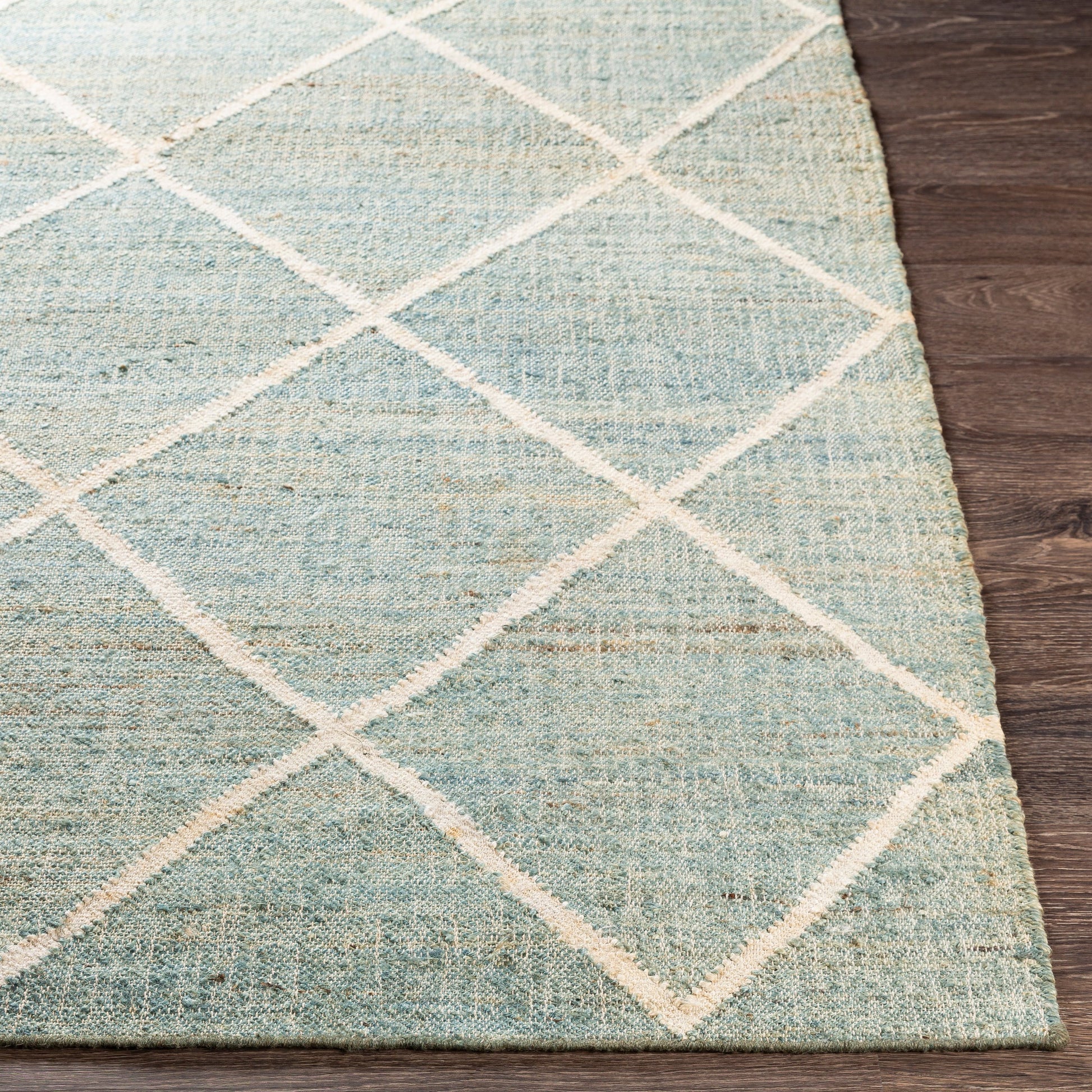 Cadence Rug by Surya in dusty sage, beige, pale blue, light brown, ivory. Made from 100% jute in a modern style.