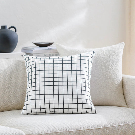 Check Pillow - 481701 by Livabliss in off-white, light silver, onyx. Made from front: 100% polyester, back: 100% polyester in a modern style.