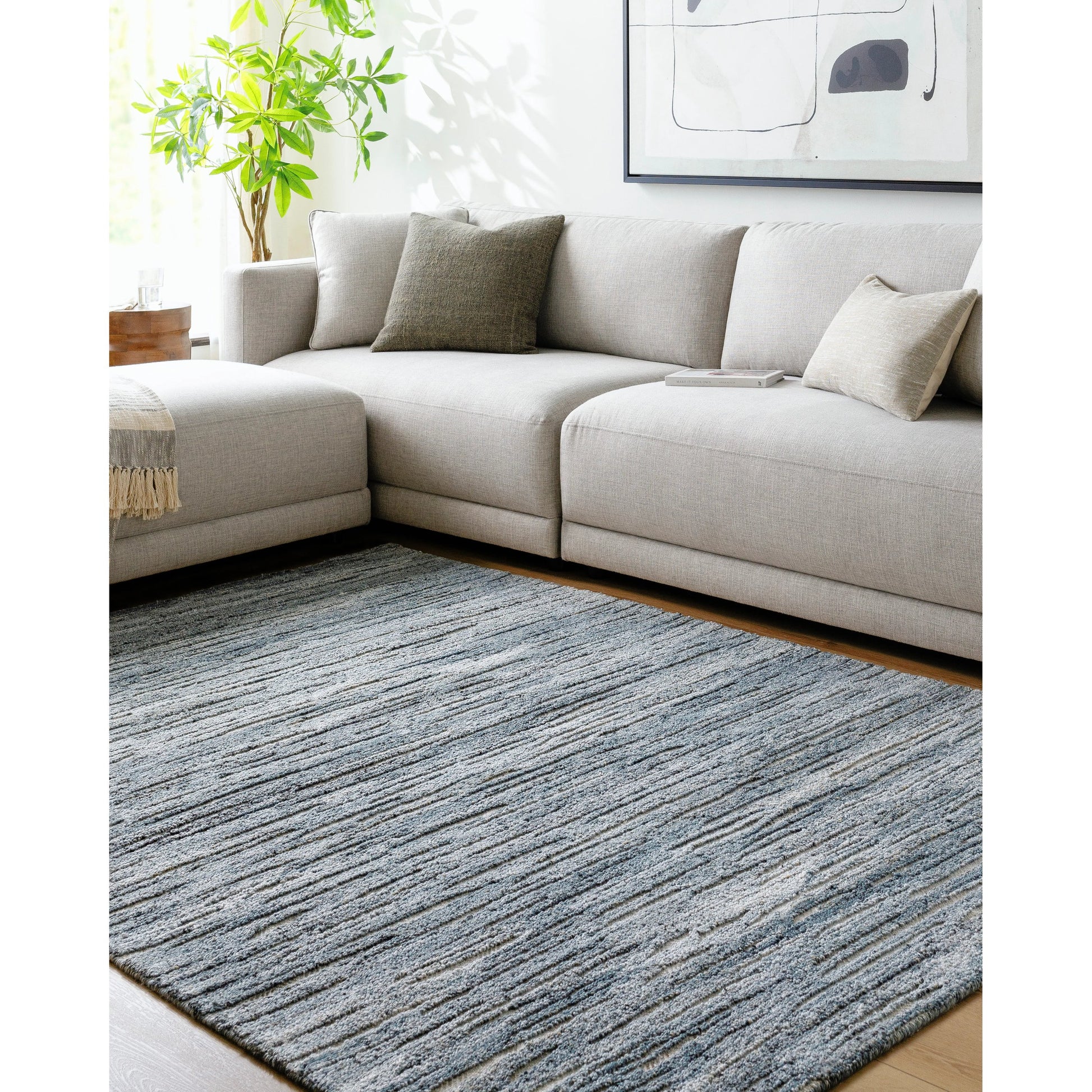 Calgary CGR-2308 Rug by Surya in dark blue, charcoal, navy, medium gray, pale blue, cream. Made from 100% recycled pet yarn in a unique style.