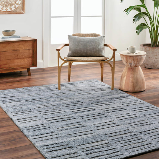 Calgary Rug - 33693 by Surya in dark blue, charcoal, navy, medium gray, pale blue, cream. Made from 100% recycled pet yarn in a unique style.