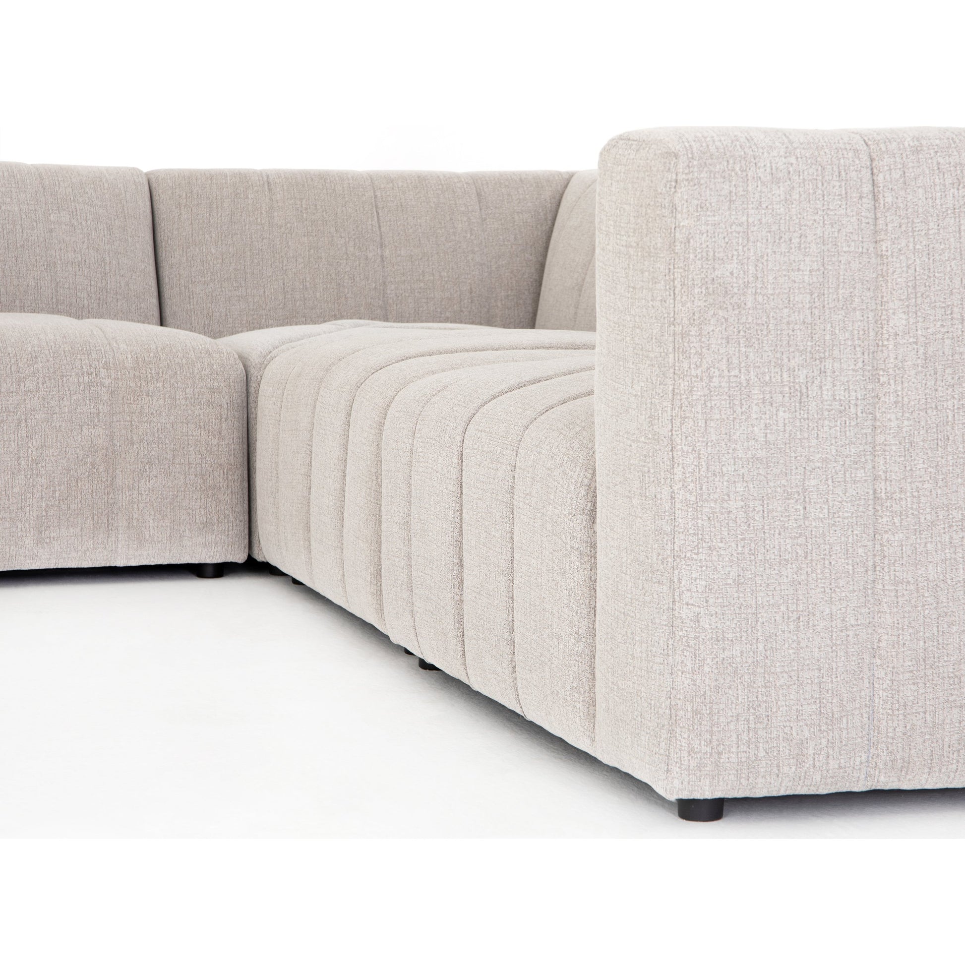 Langham Channeled 6-Piece Sectional by Four Hands in fayette cloud. Made from 97% polyester, 3% acrylic, poplar plywood, 58% polyester, 39% wool, 3% cotton in a modern style.