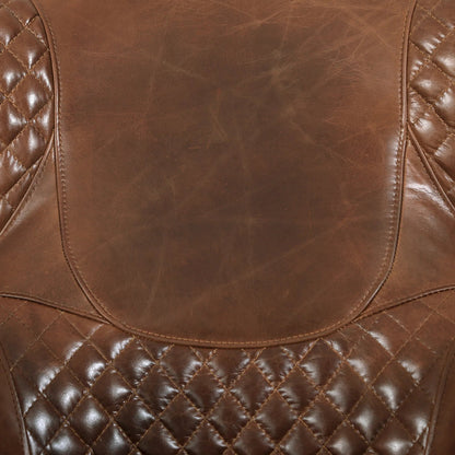 Aspen Leather Wingback Chair by Pasargad Home in cuba brown. Made from leather in a traditional style.