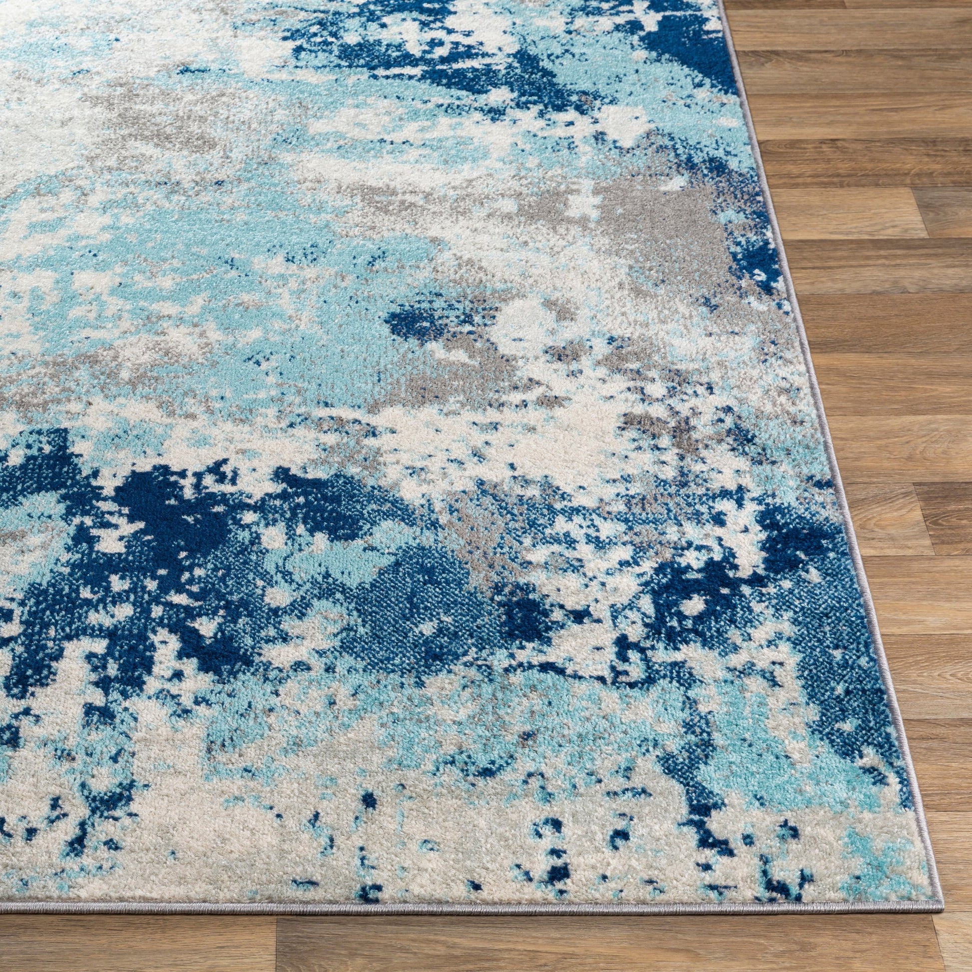Chester Rug by Livabliss in dark blue, aqua. Made from 100% polypropylene in a modern style.