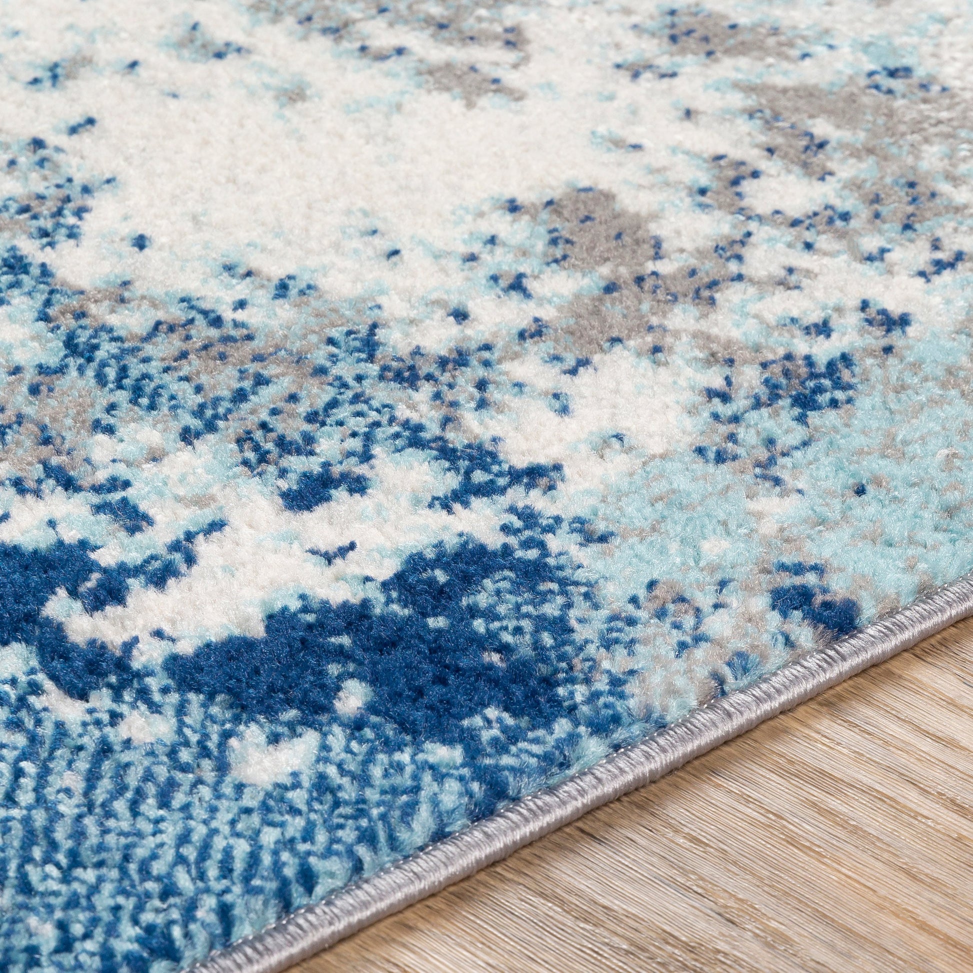 Chester Rug by Livabliss in dark blue, aqua. Made from 100% polypropylene in a modern style.