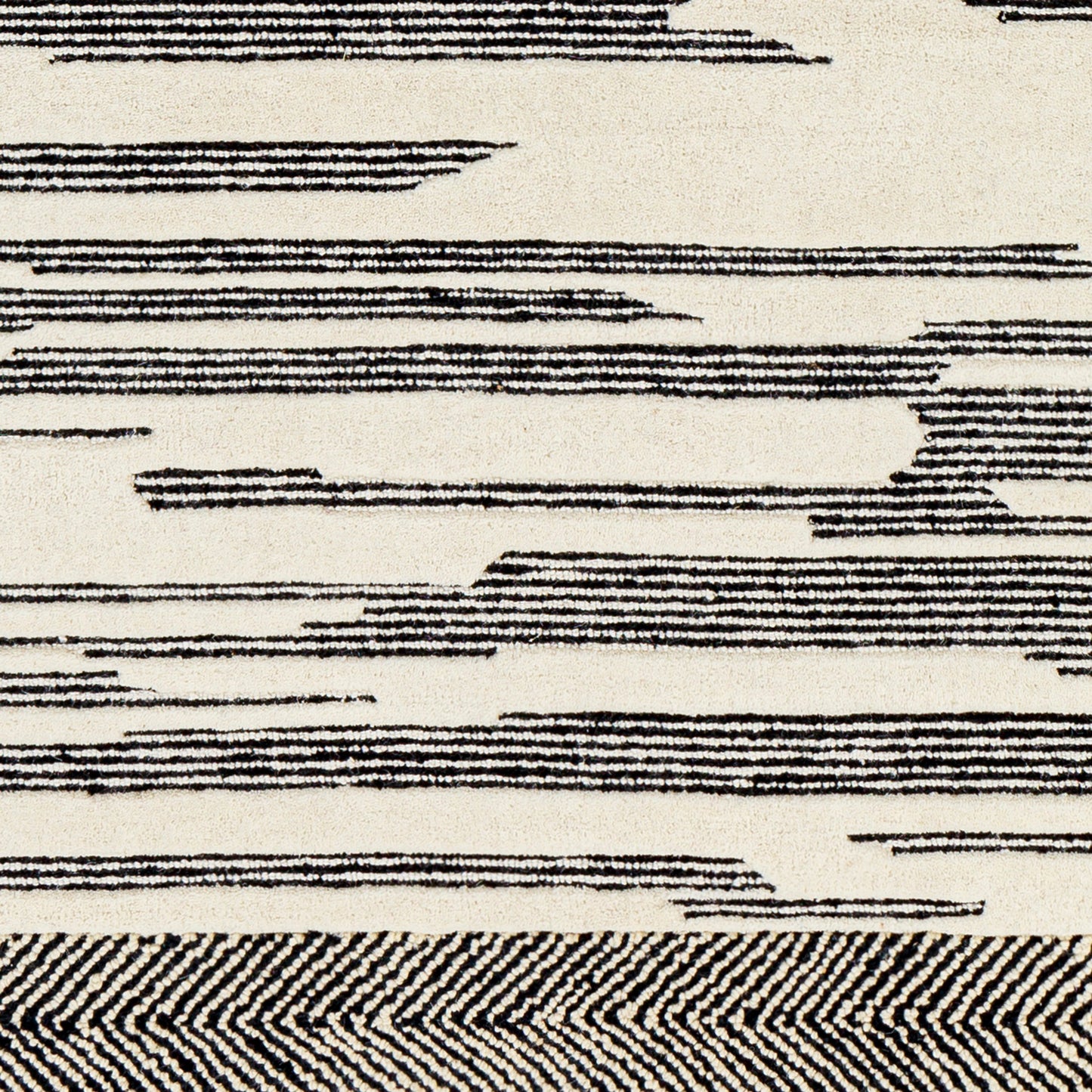 007 SI-1826311,SI-1826312,SI-1826313,SI-1826314,SI-1826315,SI-1826316,SI-1826317 | Closeup | Cherokee Rug - 29981 by Livabliss in black, cream. Made from 100% wool in a unique style.