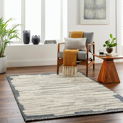Cherokee Rug - 30181 by Livabliss in oatmeal, charcoal, black, cream. Made from 100% wool in a unique style.