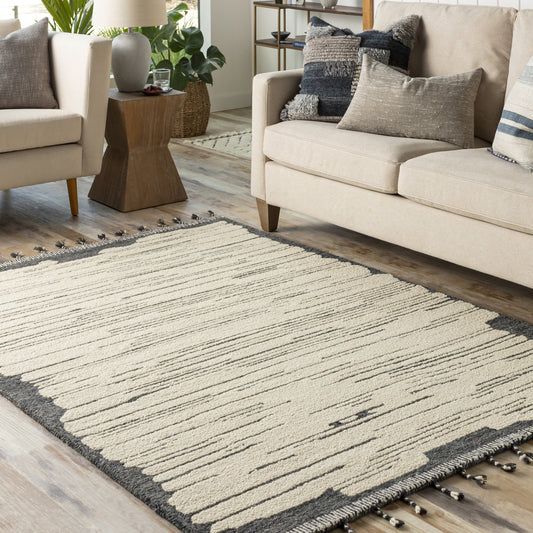 Cherokee Rug - 30181 by Livabliss in oatmeal, charcoal, black. Made from 100% wool in a unique style.