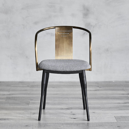 Janel Tub Chair by Zentique in matte black, bronze frame, grey fiber blend. Made from steel, fiber blend in a eclectic & global style.