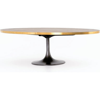 Evans Oval Dining Table by Four Hands in reclaimed burnt oak, vessel grey, polished brass. Made from solid reclaimed oak, iron, stainless steel in a modern style.