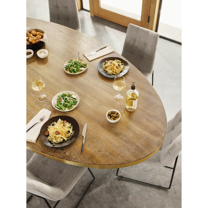 Evans Oval Dining Table by Four Hands in reclaimed burnt oak, vessel grey, polished brass. Made from solid reclaimed oak, iron, stainless steel in a modern style.