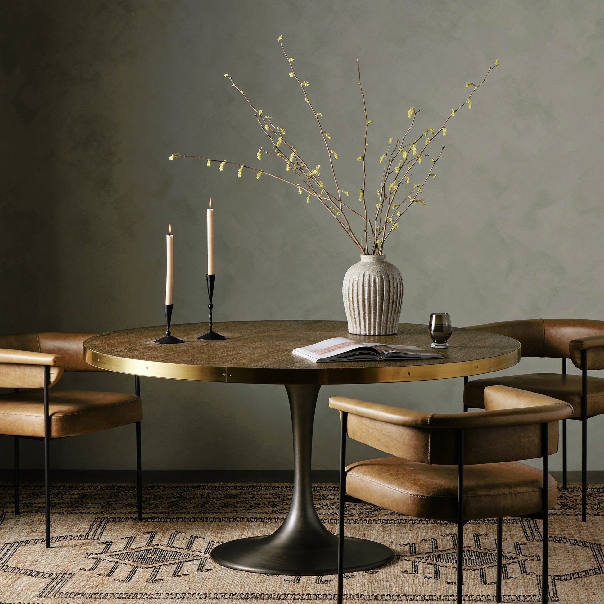 Evans Round Dining Table by Four Hands in reclaimed burnt oak, vessel grey, polished brass. Made from solid reclaimed oak, iron, stainless steel in a modern style.
